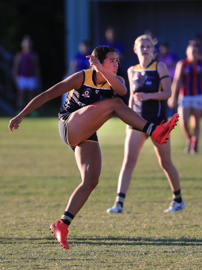 August 16, Gold Coast, Queensland - Lucy Single from Bond University in action against Wilston Grange in the Queensland AFLW played at Bond University on the Gold Coast. Scott Powick Newscorp