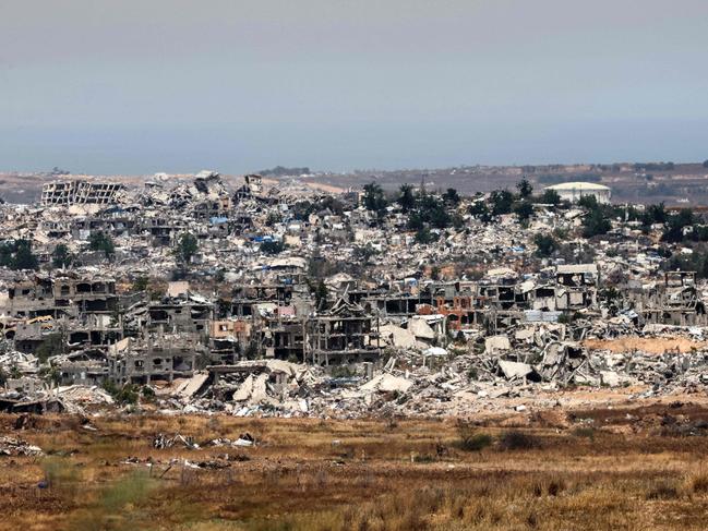Destroyed buildings in the Gaza Strip seen from southern Israel. Picture: AFP