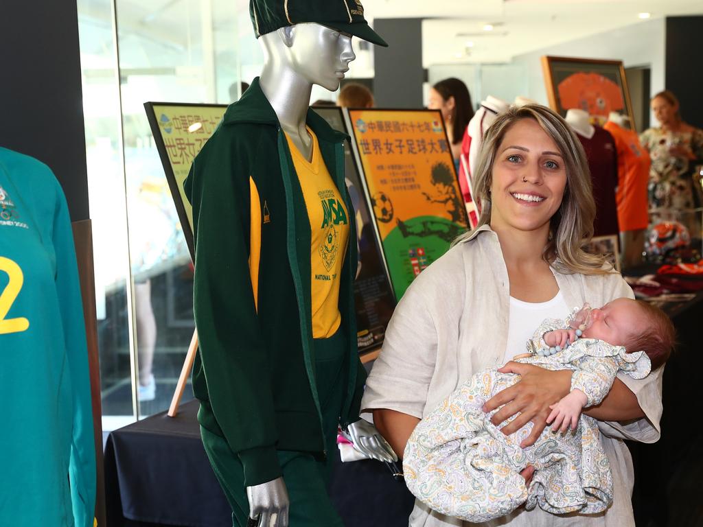 Returning Matilda Katrina Gorry is all smiles with her baby daughter Harper. Picture: Chris Hyde/Getty Images for Football Australia