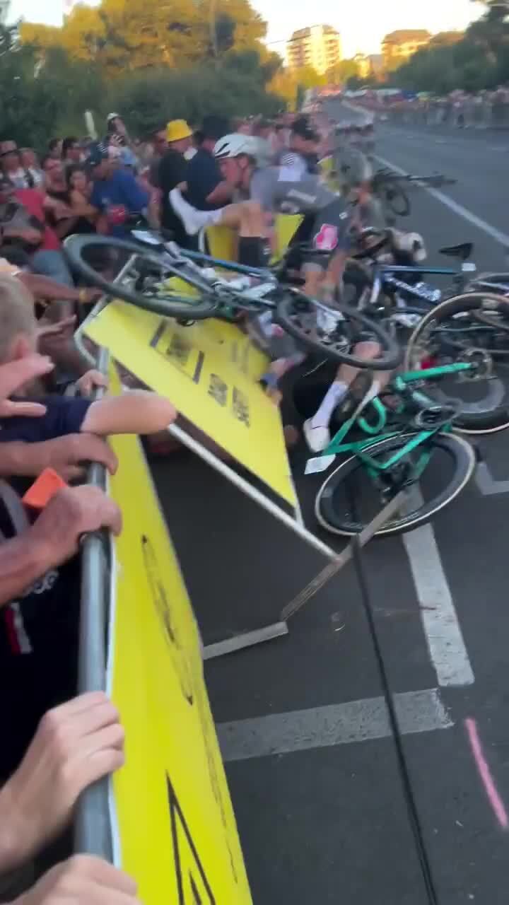 Fan hospitalised following nightmare crash in Tour Down Under