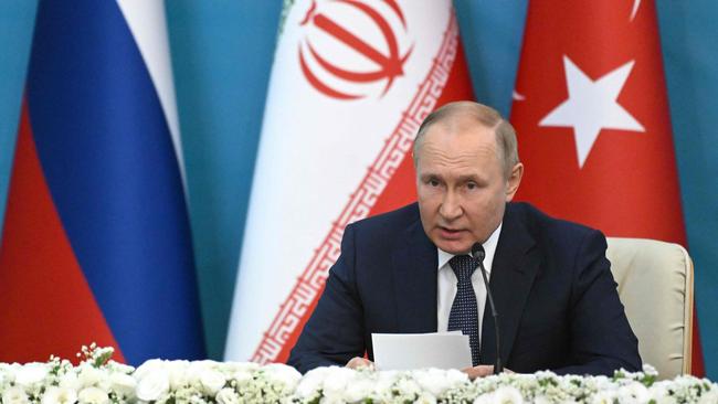 Russian President Vladimir Putin attends a joint press conference with his Iranian and Turkish counterparts in Tehran. Picture: AFP