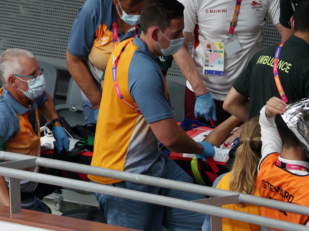 England’s Matt Walls is carried on a stretcher. Picture: Adrian Dennis/AFP