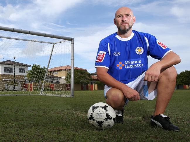 Former Leicester City skipper Danny Tiatoo in his club colours poses for portrait at his residence in Helensvale, Gold Coast. The English Premier League (EPL) side is on the brink of making history by winning their first EPL title this season. Photo: Regi Varghese