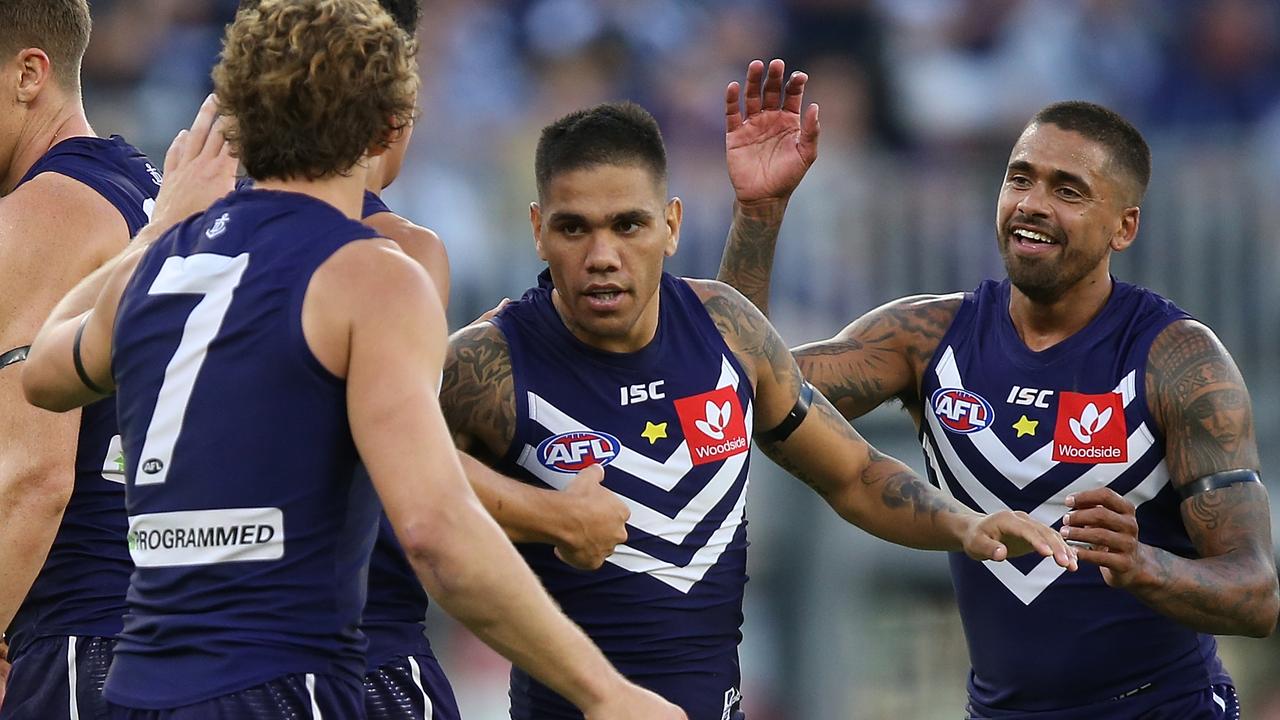 Michael Walters celebrates a goal with his teammates on Sunday.