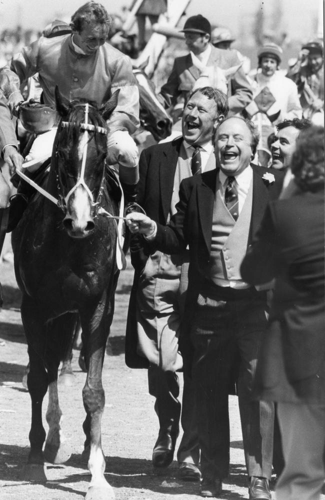 Dittman on Gurner’s Lane with jubilant owners Tom Borthwick and Andrew Ramsden after winning the Melbourne Cup in 1982.