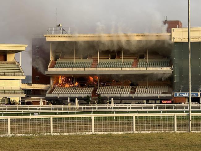 Emergency services battled a fire at the Caulfield Racecourse grandstand. Picture: X