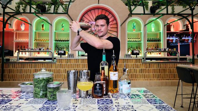 Mexicairns is Cairns' latest entertainment venue, featuring Mexican food and drinks, six classic game zones, lounges, and an agave bar selling Cairns' largest range of tequila. Mexicairns bartender Mark McDowall shakes up some margaritas for thirsty patrons. Picture: Brendan Radke