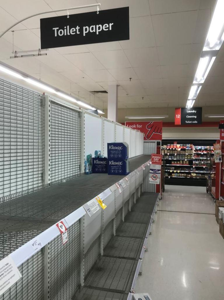 Shelves have been cleared of loo rolls, with this Coles Grafton being snapped completely bare. Picture: Facebook