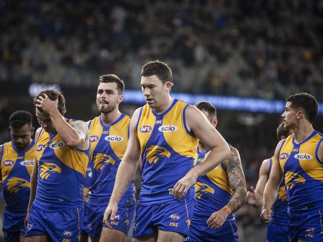 The Eagles leave the oval after their defeat during the Round 14 AFL match between the West Coast Eagles and the Essendon Bombers at Optus Stadium in Perth, Thursday, June 21, 2018. (AAP Image/Tony McDonough) NO ARCHIVING, EDITORIAL USE ONLY