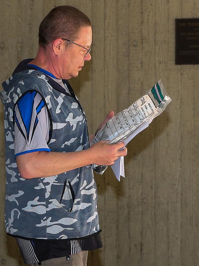 Zahar Levin leaving Surry Hills police station after being charged by police for allegedly making offensive posts online. Picture: Daily Telegraph