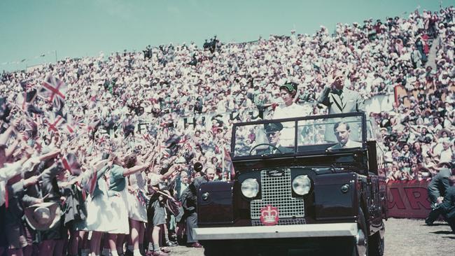 Queen Elizabeth II and Prince Philip wave to the crowd whilst on their Commonwealth visit to Australia in 1954. Picture: Getty