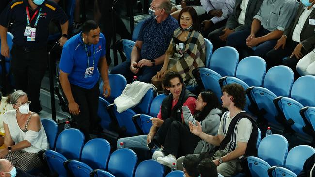 Three spectators are removed by security staff during the doubles final. Picture: Clive Brunskill/Getty