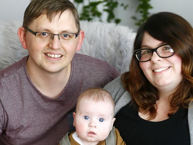 Tassie Tots Cheekiest boy winner - Oliver Doherty (4 months) is pictured with his parents, Adrian and Ashleigh Doherty of Claremont. Picture: MATT THOMPSON