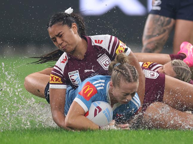 Experts have been called in to investigate the drainage system at Allianz Stadium after the pitch was left waterlogged in Game II of the Women’s State of Origin. Picture: Getty Images