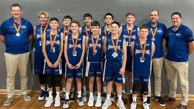 The Rockhampton Rockets players and coaching staff proudly display the silver medals they won at the Australian Under-14 Club Championships in Sydney.