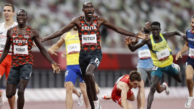 Kenyans Emmanuel Korir and Ferguson Rotitch claimed gold and silver, but Peter Bol nearly got cleaned up as he crossed the line. Picture: Alex Coppel