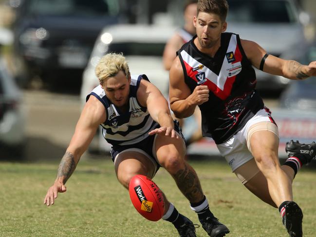 Tim Saunders (right) playing for Devon Meadows. Picture: Doug Farr