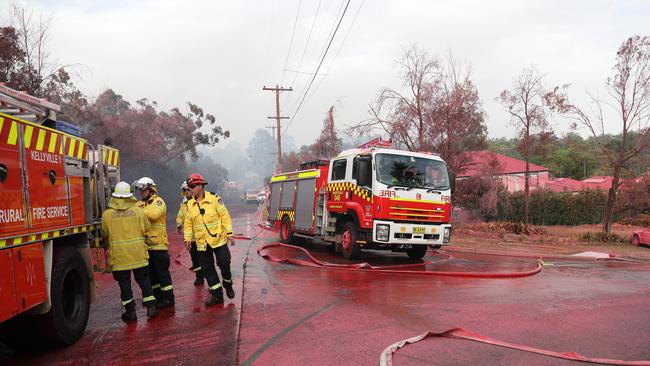 Fire retardant was dropped on threatened properties. Picture: John Grainger