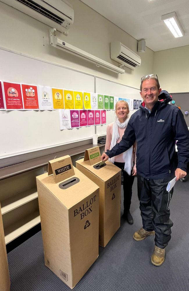 Incumbent Fisher MP Andrew Wallace casts his vote with wife Leonie at the Pelican Waters polling booth. Picture: Aisling Brennan