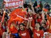 Fans of China cheer during their Group B football match against North Korea in the AFC Asian Cup in Canberra on January 18, 2015. AFP PHOTO/Peter PARKS --IMAGE RESTRICTED TO EDITORIAL USE - STRICTLY NO COMMERCIAL USE