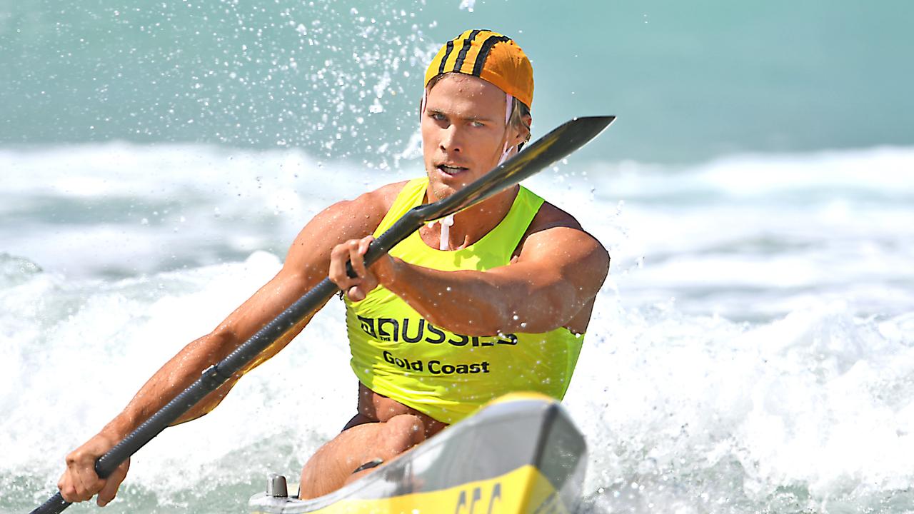 Ironman, model and reality TV star Jett Kenny in action for Alexandra Headland SLSC. Picture: HarvPix