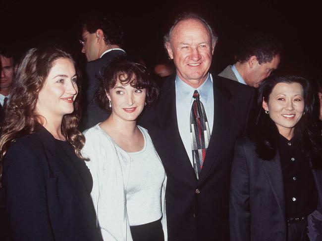 Gene Hackman pictured in 1996 with wife Betsy Arakawa and daughters Leslie and Elizabeth. The two women revealed they had not spoken to their father in “months”. Picture: Supplied