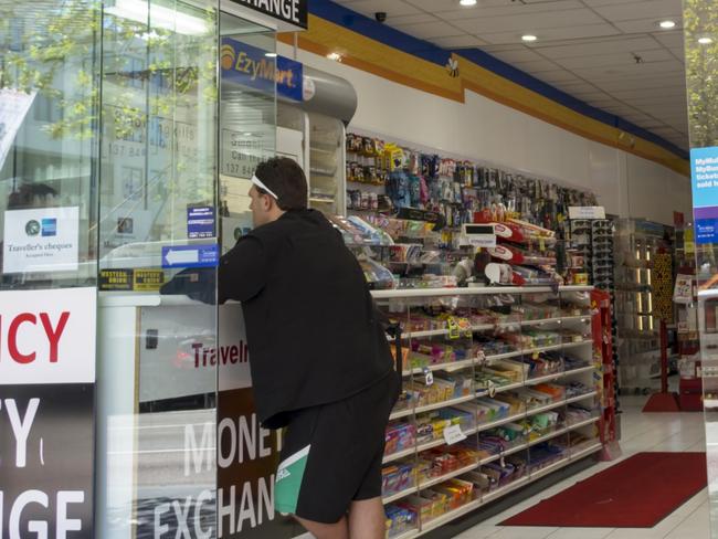 Australia, Sydney, Haymarket EzyMart convenience store front entrance business. (Photo by: Jeff Greenberg/Universal Images Group via Getty Images)