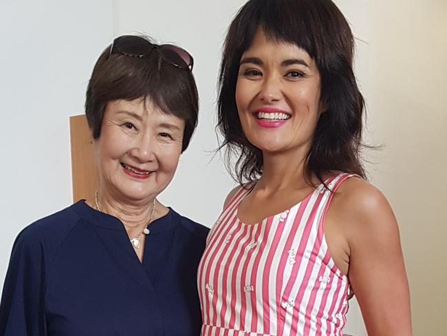 Yumi and her mum, who encouraged her to use moisturiser at an early age.