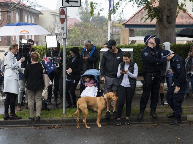 Awaiting Prince Harry and Meghan Markle to arrive at Admiralty House in Kirribilli, Sydney. Picture: Dylan Robinson