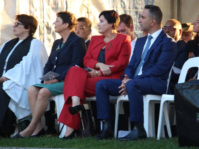 Strathfield Labor MP Jodi McKay in red and Burwood Mayor John Faker (right).