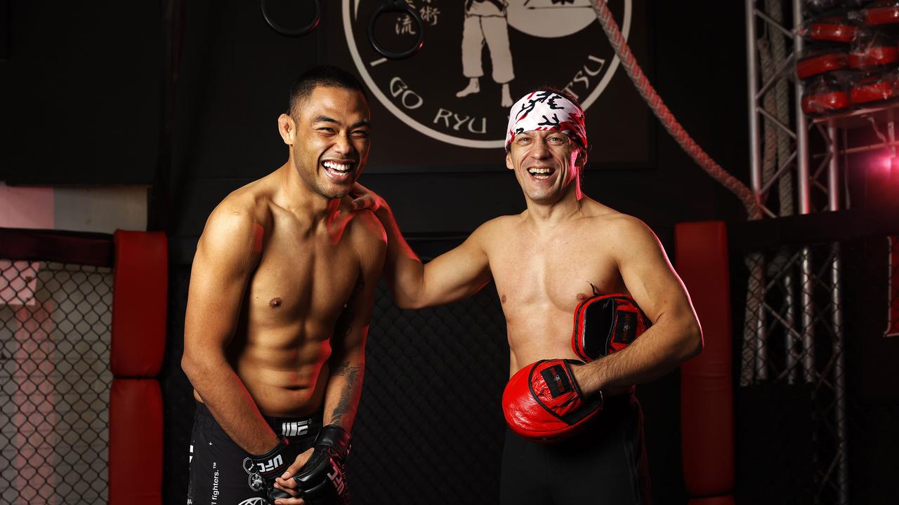 UFC fighter Josh Culibao with his trainer Igor Breakenback. Picture: Tim Hunter.