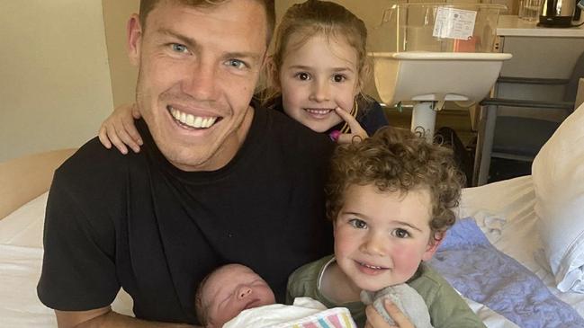 Jake Melksham with children Frankie, Teddy and newborn Alfie