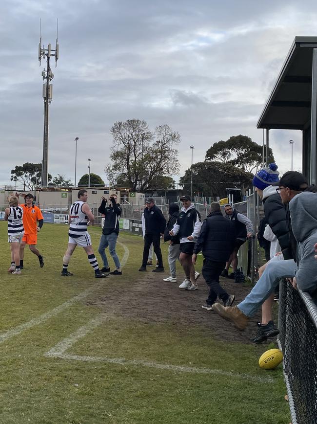 The Pearcedale bench celebrate moments after the final siren.