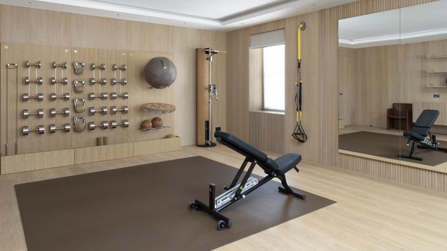 Top-quality leather and natural woods make for beautiful home gyms. Picture: supplied