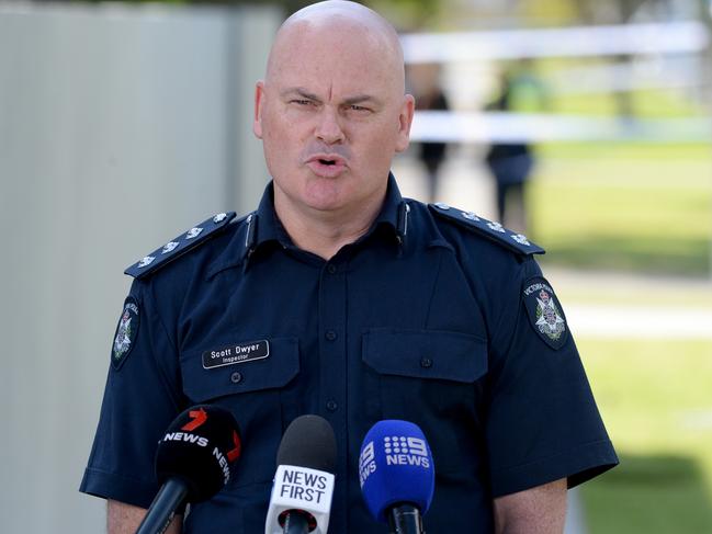 Inspector Scott Dwyer speaks to the media. Picture: Andrew Henshaw