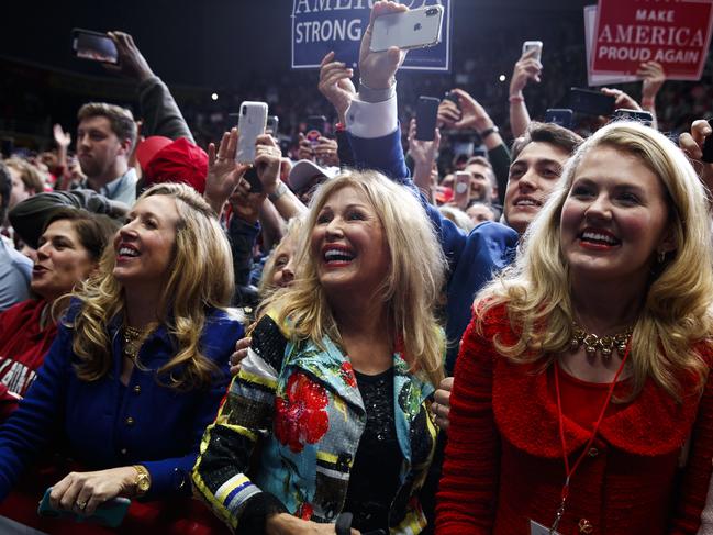 Supporters of President Donald Trump listen to him speak at a campaign rally at Bojangles' Coliseum, Friday, Oct. 26, 2018, in Charlotte, N.C. (AP Photo/Evan Vucci)