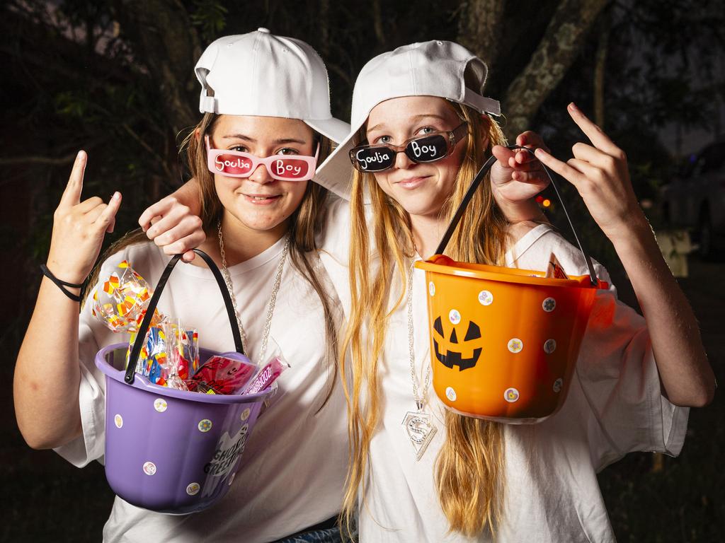 Ailey Rollans (left) and Amelia Ellis having fun on Halloween, Thursday, October 31, 2024. Picture: Kevin Farmer