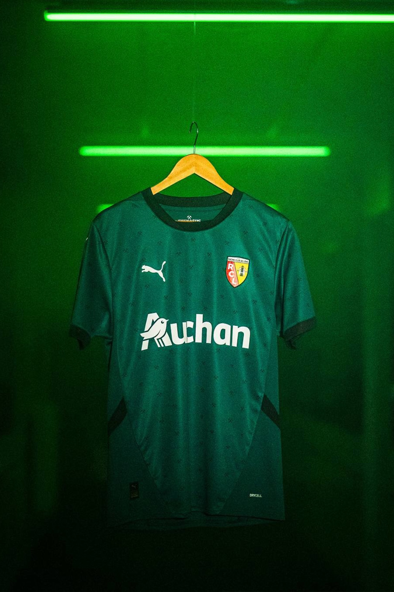 <h3>14. RC Lens Away</h3><p>&nbsp;</p><p>There&rsquo;s nothing like a good splash of green on the pitch. A lot of clubs avoid it due to not being able to be seen on screen during matches. We love this darker hue, and the repeating hammer motif is a nice touch. Easy to style with black pants, if it&rsquo;s your vibe.</p><p class="button-common"><a title="Shop the RC Lens jersey" href="https://www.catch.com.au/product/2024-2025-racing-lens-away-shirt-28323888/" target="_blank" data-cta="Shop the RC Lens jersey" data-editable="true">Shop the RC Lens jersey</a></p>