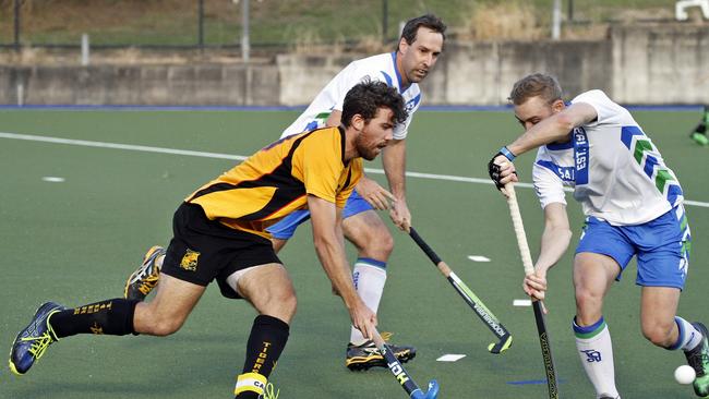 Easts' Matt Pembroke pushes the ball past Pine Rivers St Andrews' Jacob Anderson. Picture: Terry Disteldorf