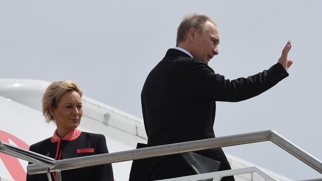 Russian President Vladimir Putin farewells Brisbane on Sunday after ducking out of the summit a few hours early in order to catch up on sleep. Pic: Steve Holland/G20 Australia via Getty Images