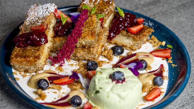 This chia drenched French toast with roast green apple ice cream, blackberry compote, salted caramel sauce and Anzac cookie crumble from Cardamom Pod is one of the many amazing breakfasts on the Gold Coast. But who is the best? Picture: Jerad Williams