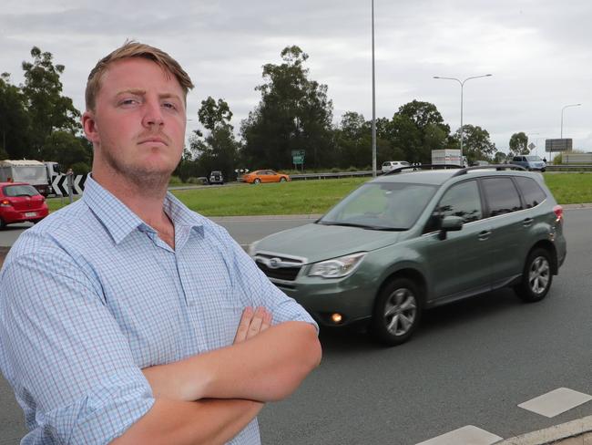 Division 1 candidate Alec Pokarier has a plan to fix roundabouts near the M1 at Ormeau, which he says see residents spend up to 45 minutes in traffic daily. Picture Glenn Hampson