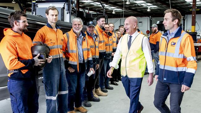 Premier Peter Gutwein is at PFG Group to announce commitment to secure local jobs. Peter Gutwein is shown with PFG's staff and CEO Rob Inches. Picture Eddie Safarik