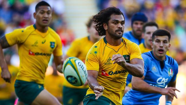 June 24, 2017, and the Wallabies Karmichael Hunt passes the ball during the international rugby match between Australia and Italy at Suncorp Stadium in Brisbane. Photo: AFP