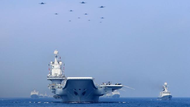 Chinese warships and fighter jets take part in South China Sea exercises. Picture: Reuters