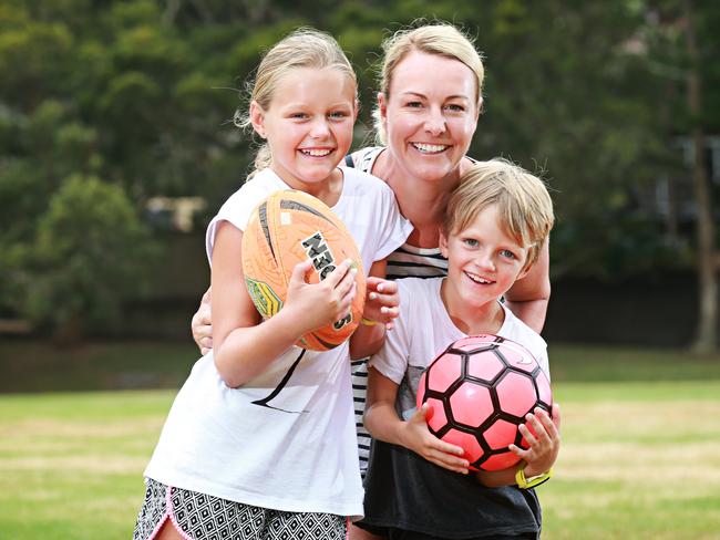 Kids will be given devices to wear which will measure how active they are during the day. Pictured is Emma Links with her daughter Mia and Jamie. Picture: Adam Yip/Manly Daily