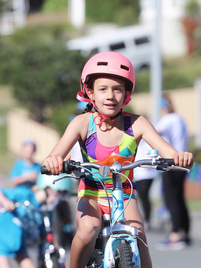 Participants competing in the Bupa KidFit Series triathlon beginning their cycling leg at Blackmans Bay Beach. Picture: LUKE BOWDEN