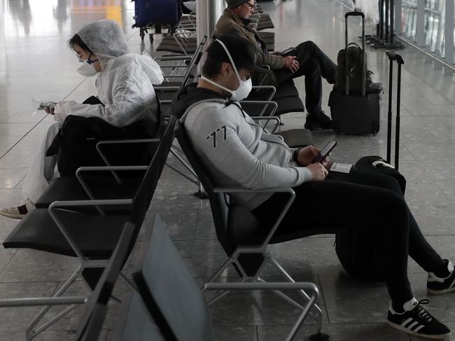 TPassengers wait for flights at Heathrow. Picture: AP