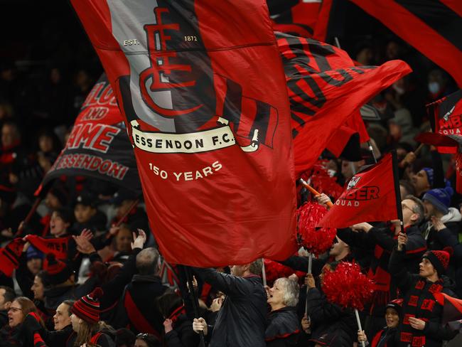 MELBOURNE, AUSTRALIA - JULY 31: Bombers fans cheer during the round 20 AFL match between the Essendon Bombers and the North Melbourne Kangaroos at Marvel Stadium on July 31, 2022 in Melbourne, Australia. (Photo by Daniel Pockett/Getty Images)