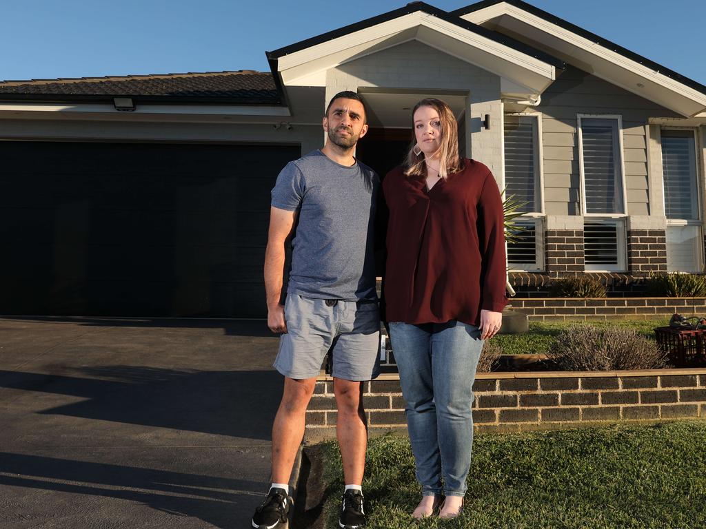 Danny and Marielle Moussa pictured outside their home in Spring Farm. Picture: Damian Shaw